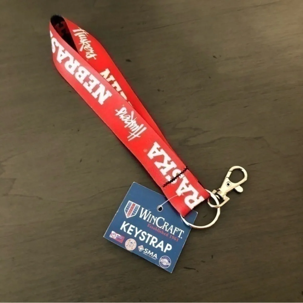Wincraft University Of Nebraska Keystrap Huskers Red Black Reversible Keychain - Picture 1 of 3